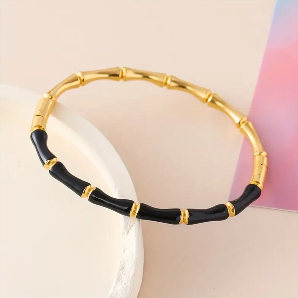 Elegant Gold and Black Bamboo Bracelet